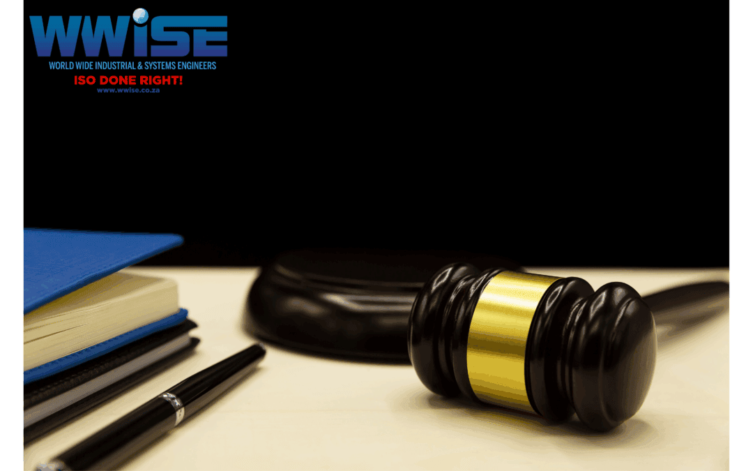 Legal and Compliance showcasing a judge's hammer on the table with some papers