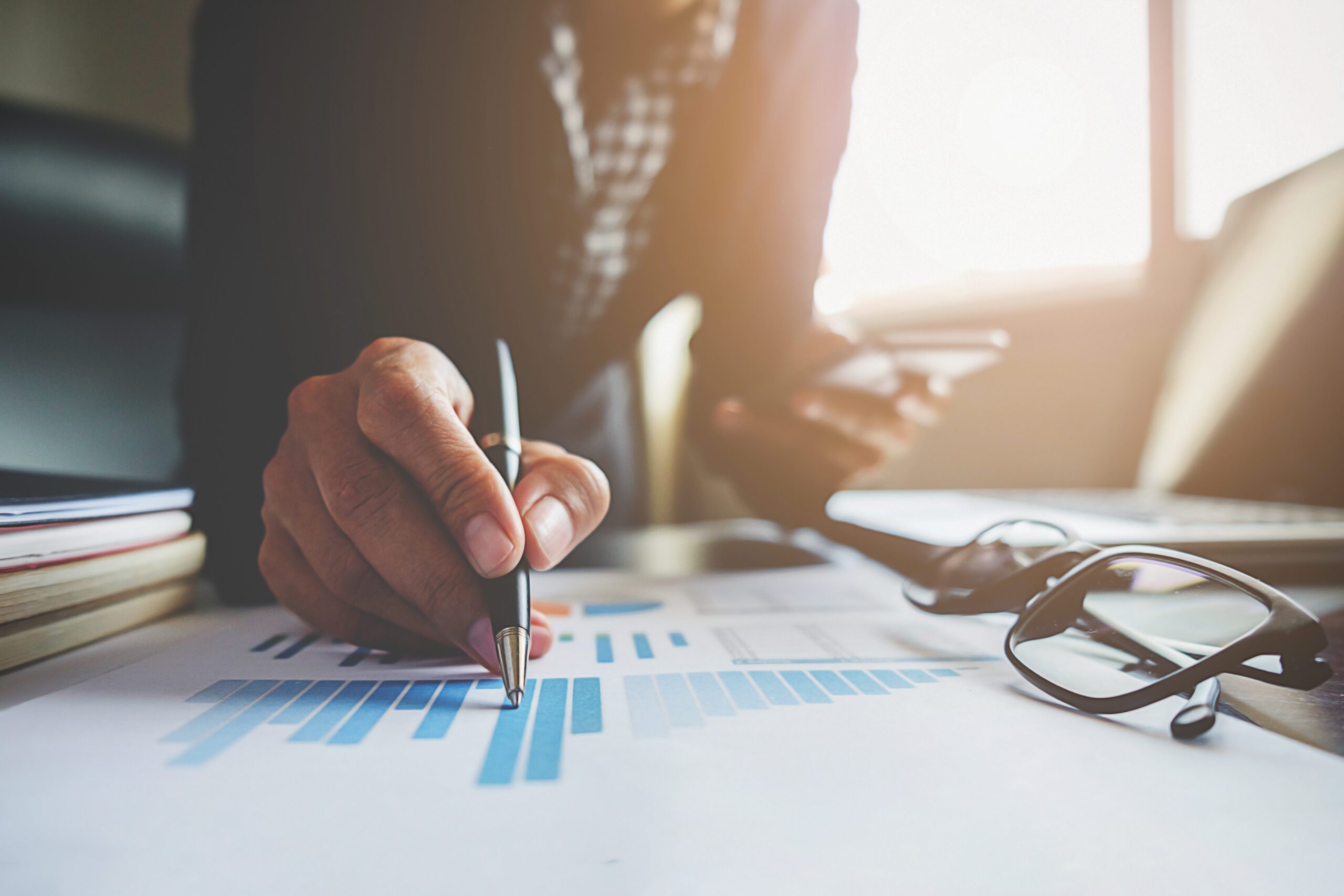 Person reading an analytics table, and in this showcasing Gap Analysis vs Internal Audit